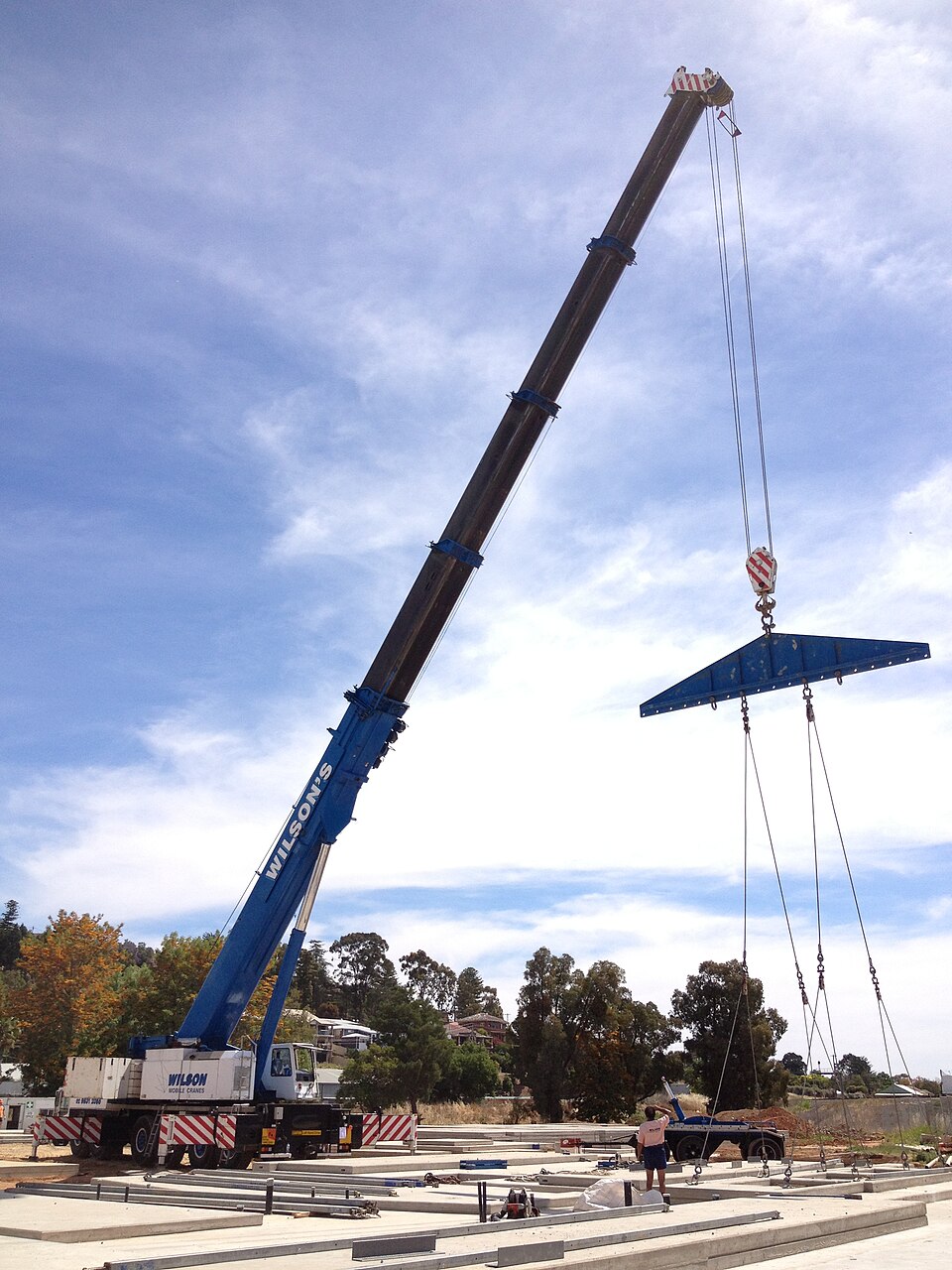 construction crane lifting concrete